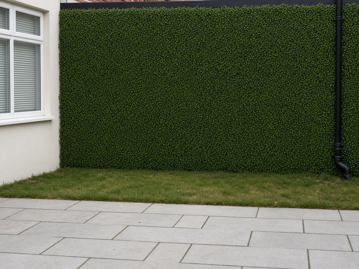 The same garden wall with artificial box hedging fitted
